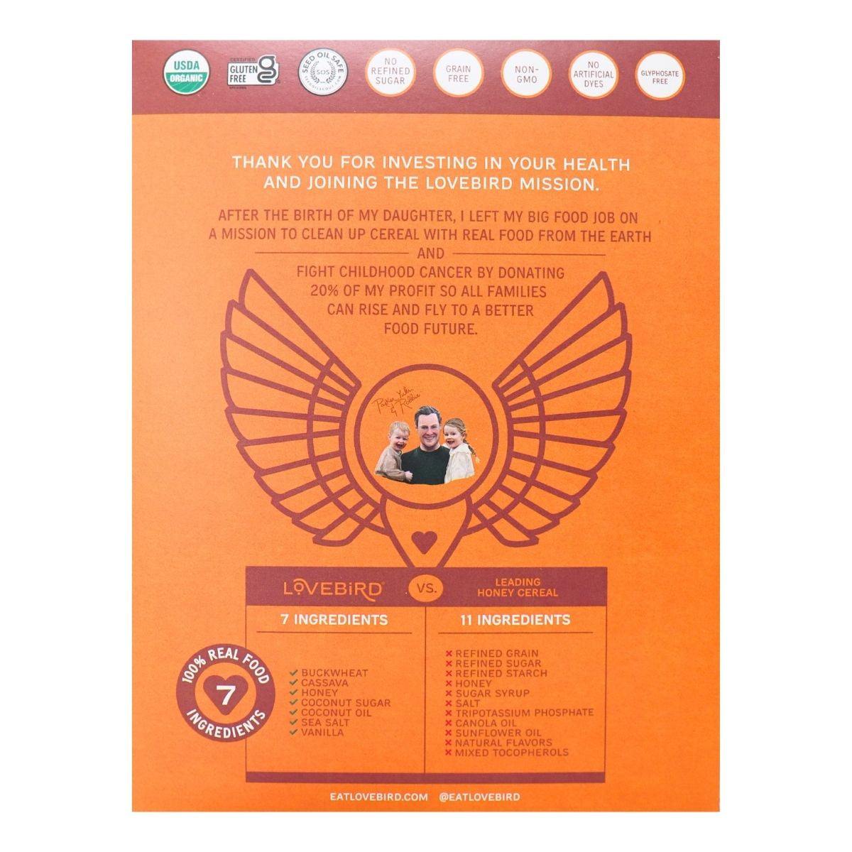 Orange cereal box with Lovebird branding and mission statement on a white background